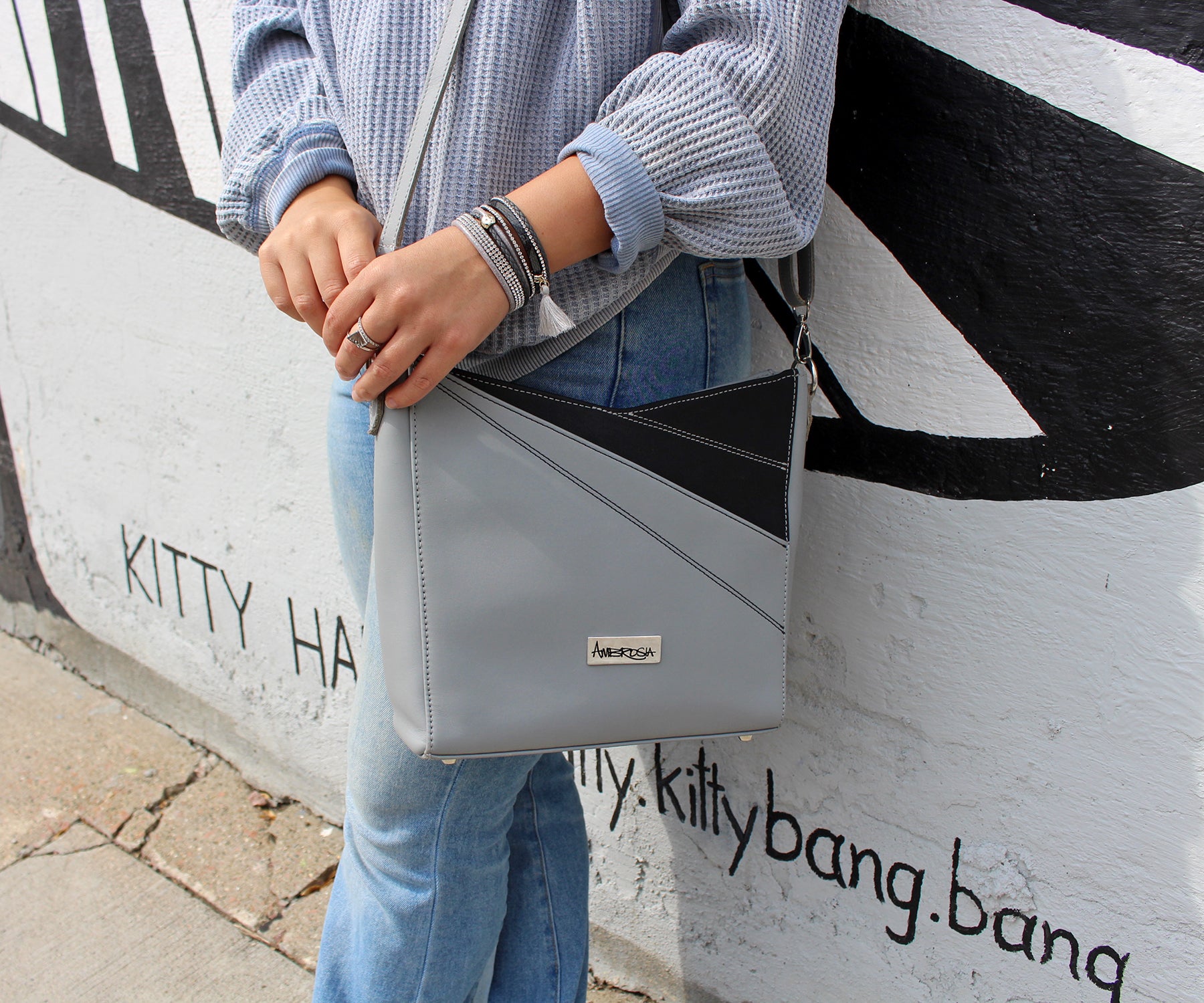 Bolso de mano de piel de diseño angular Galloper gris y negro