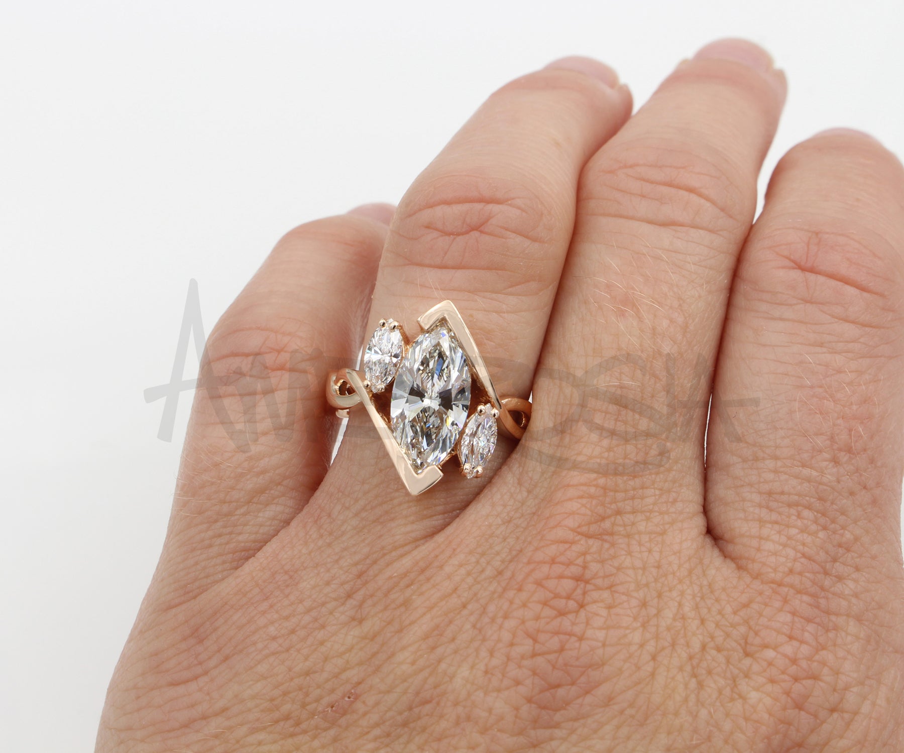 Twist Three Marquise Diamond Rose Gold Engagement Ring