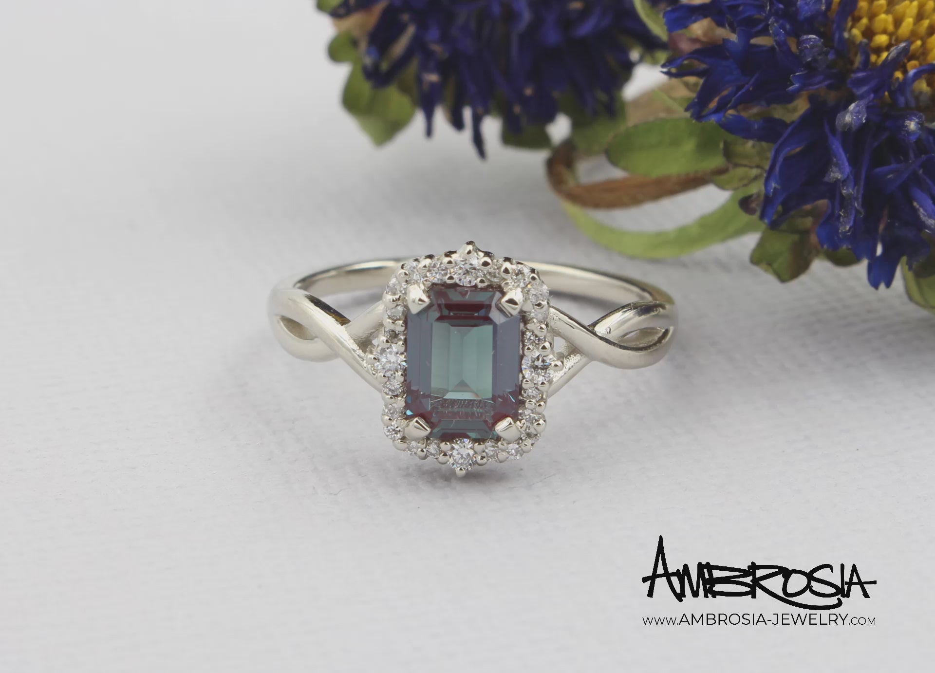 Emerald cut Alexandrite Halo Twist Diamond Engagement Ring