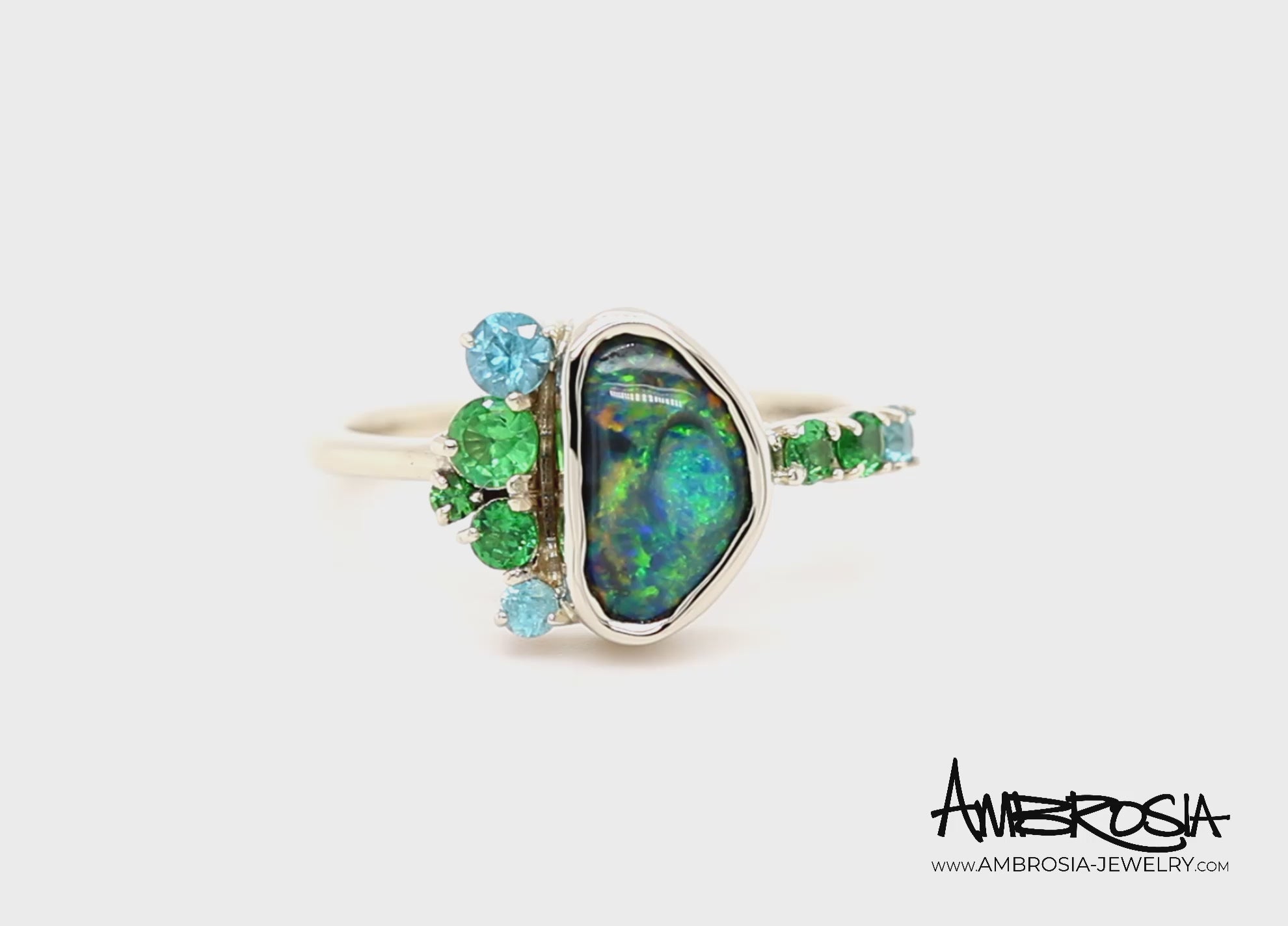 Offset Opal and Green Garnet Zircon Ring