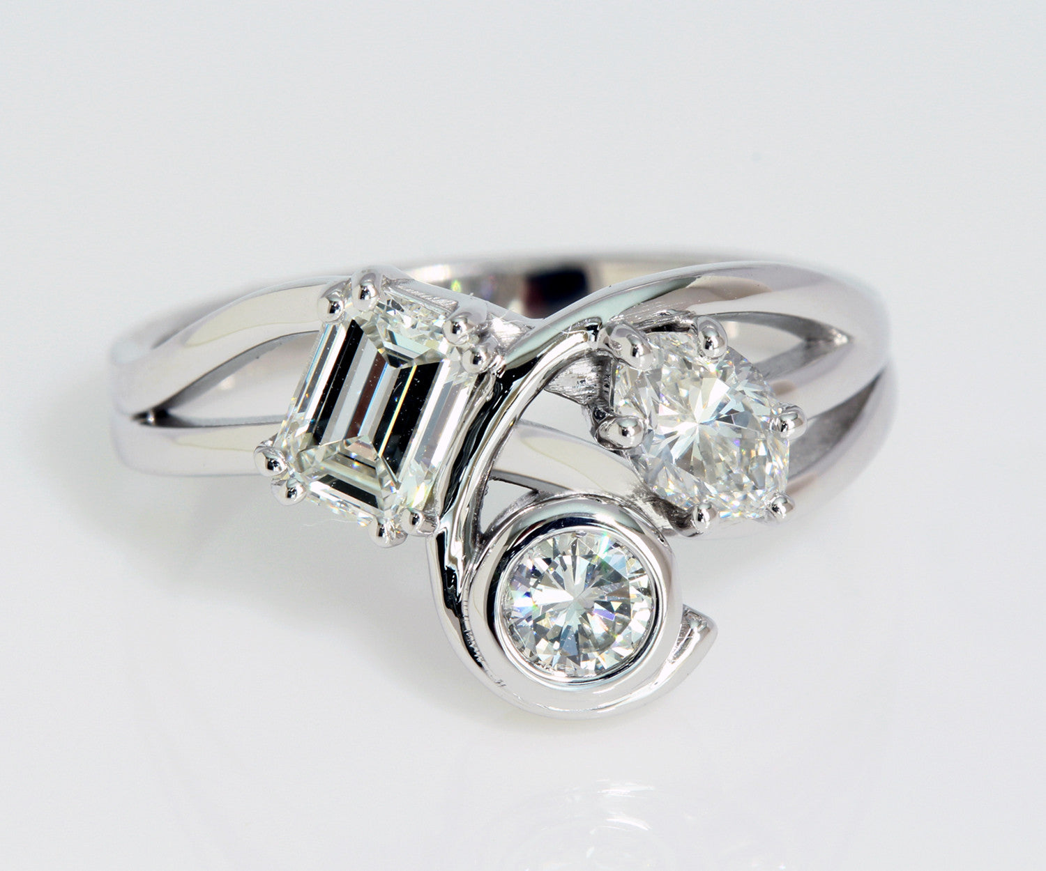 Unique curved three diamond ring redesign