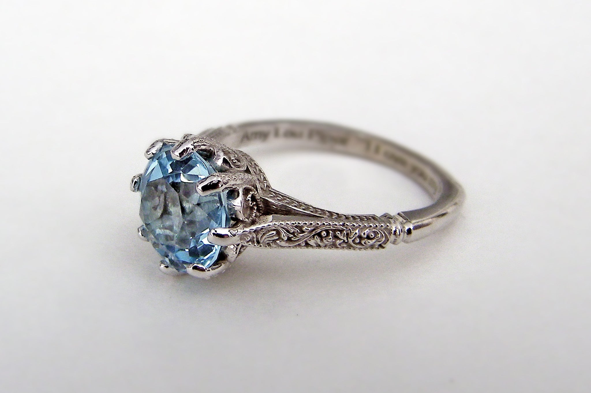 custom designed vintage engraved blue topaz engagement ring