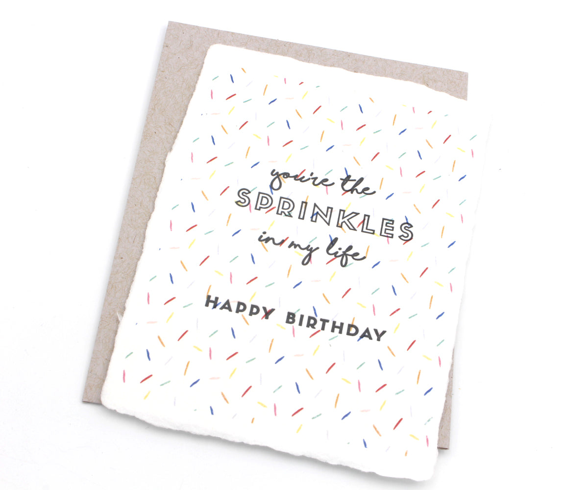 Tarjeta de felicitación hecha a mano con chispas de cumpleaños