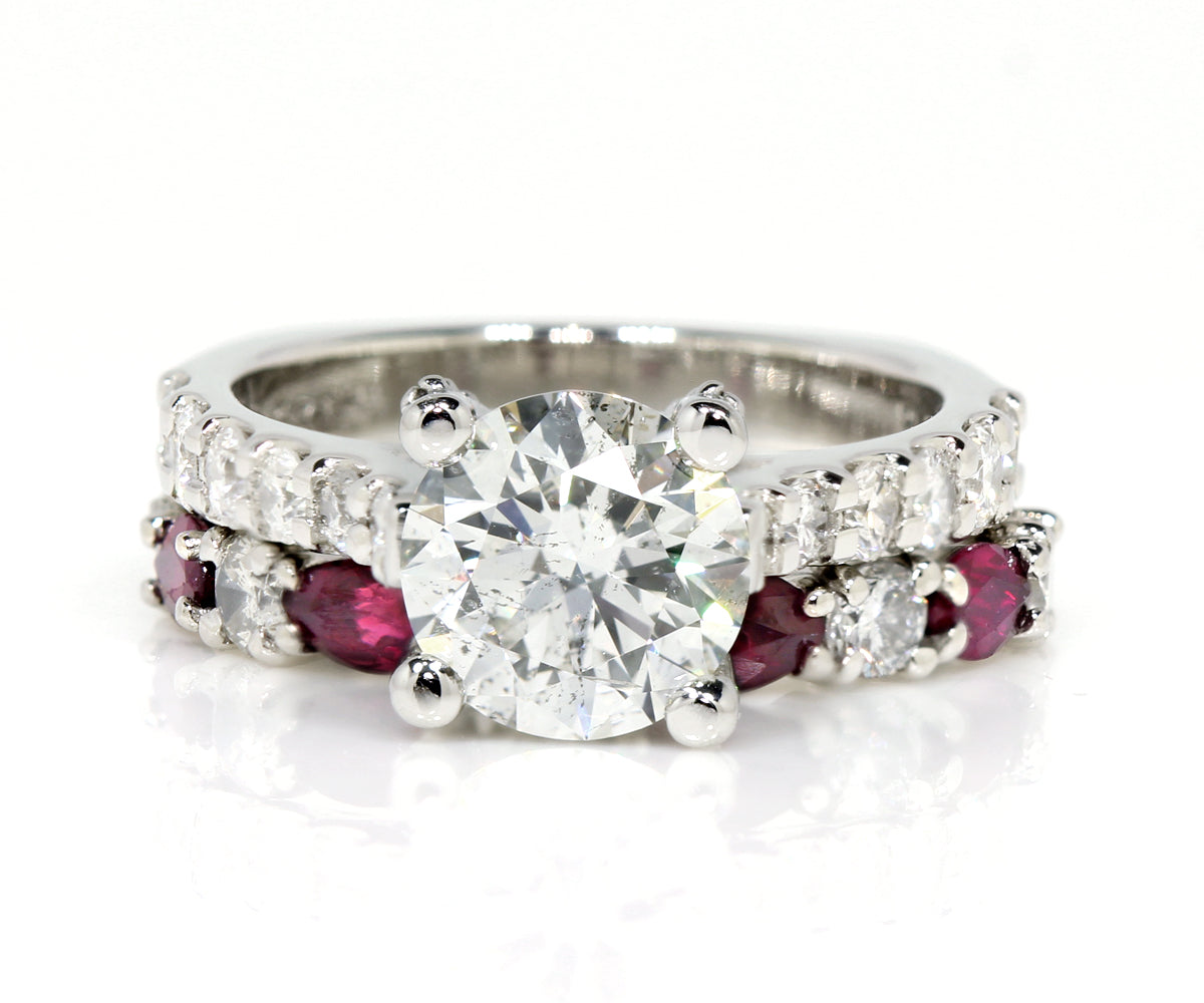 Cathedral Diamond and Ruby Platinum Wedding Ring Set