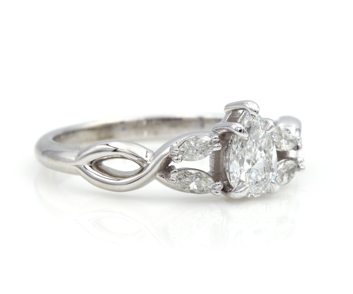 Pear Diamond and Marquise Twist Engagement Ring