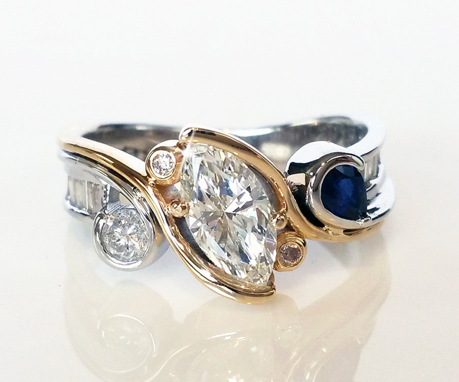 redesigned custom two tone marquise diamond blue sapphire ring