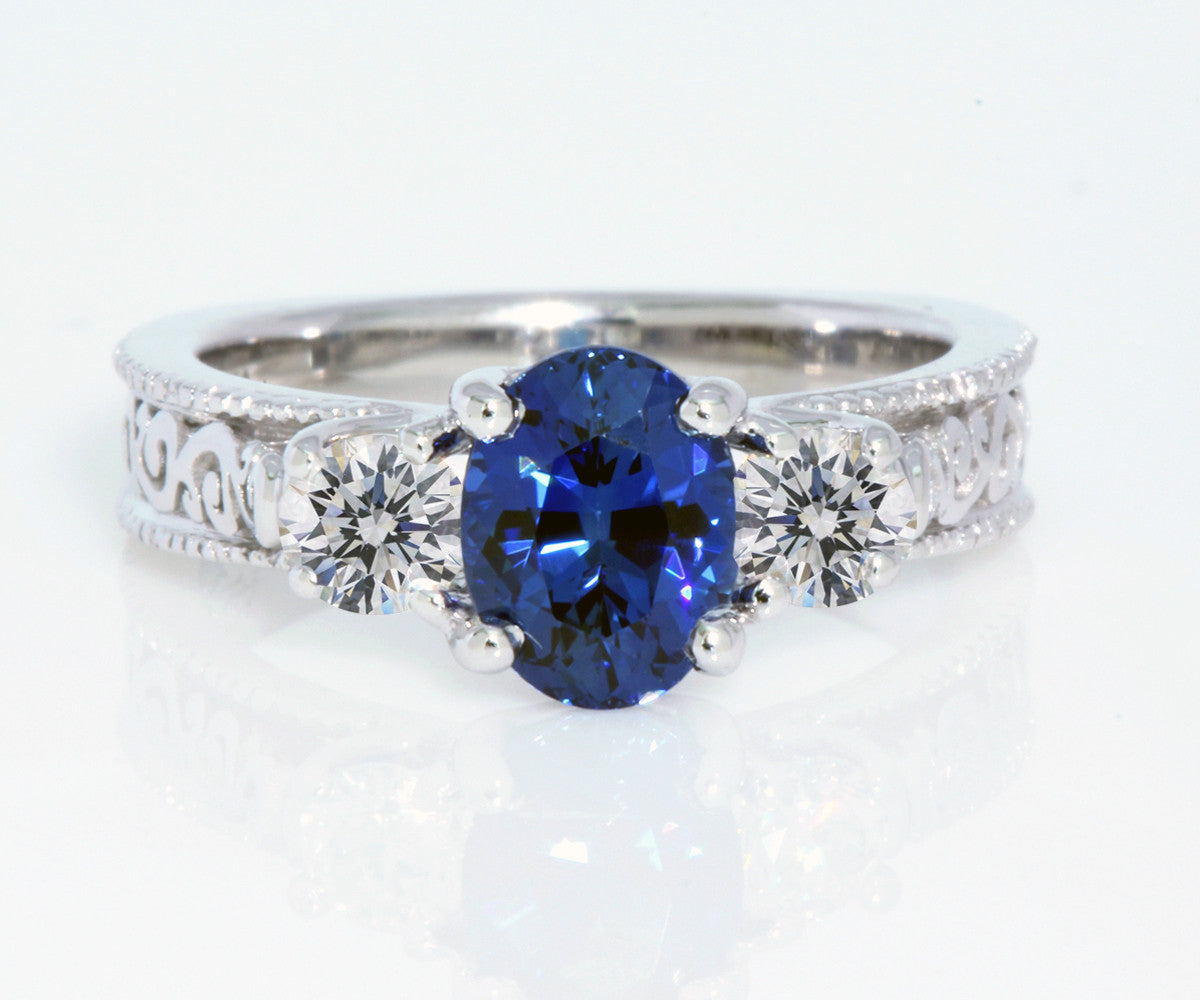 custom blue sapphire diamond swirl engagement ring
