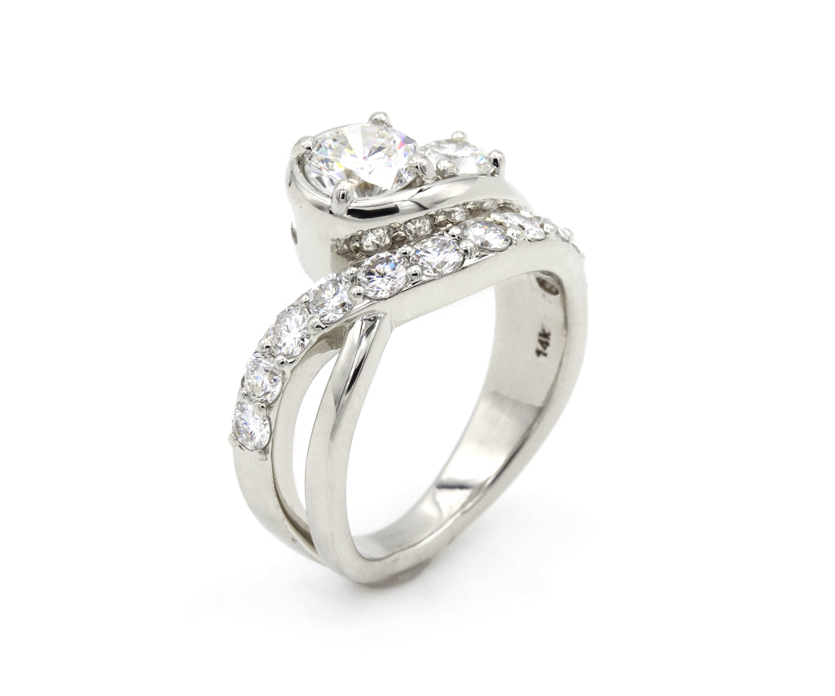 Curved Swirl Round Diamond and Baguette Ring
