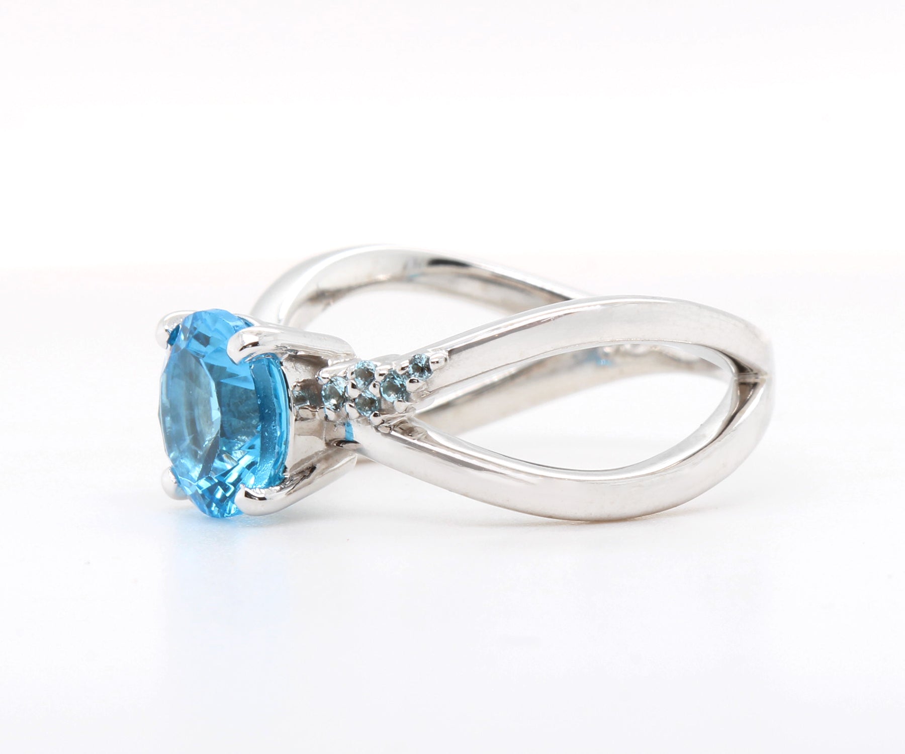 Criss Cross Starburst Blue Topaz Ring