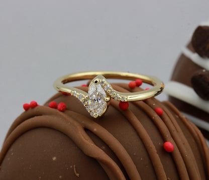 Delicado anillo con diamantes de talla marquesa