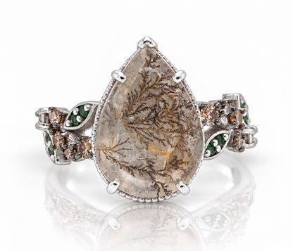 Anillo Art Déco dorado con halo de ágata musgosa y hexágono