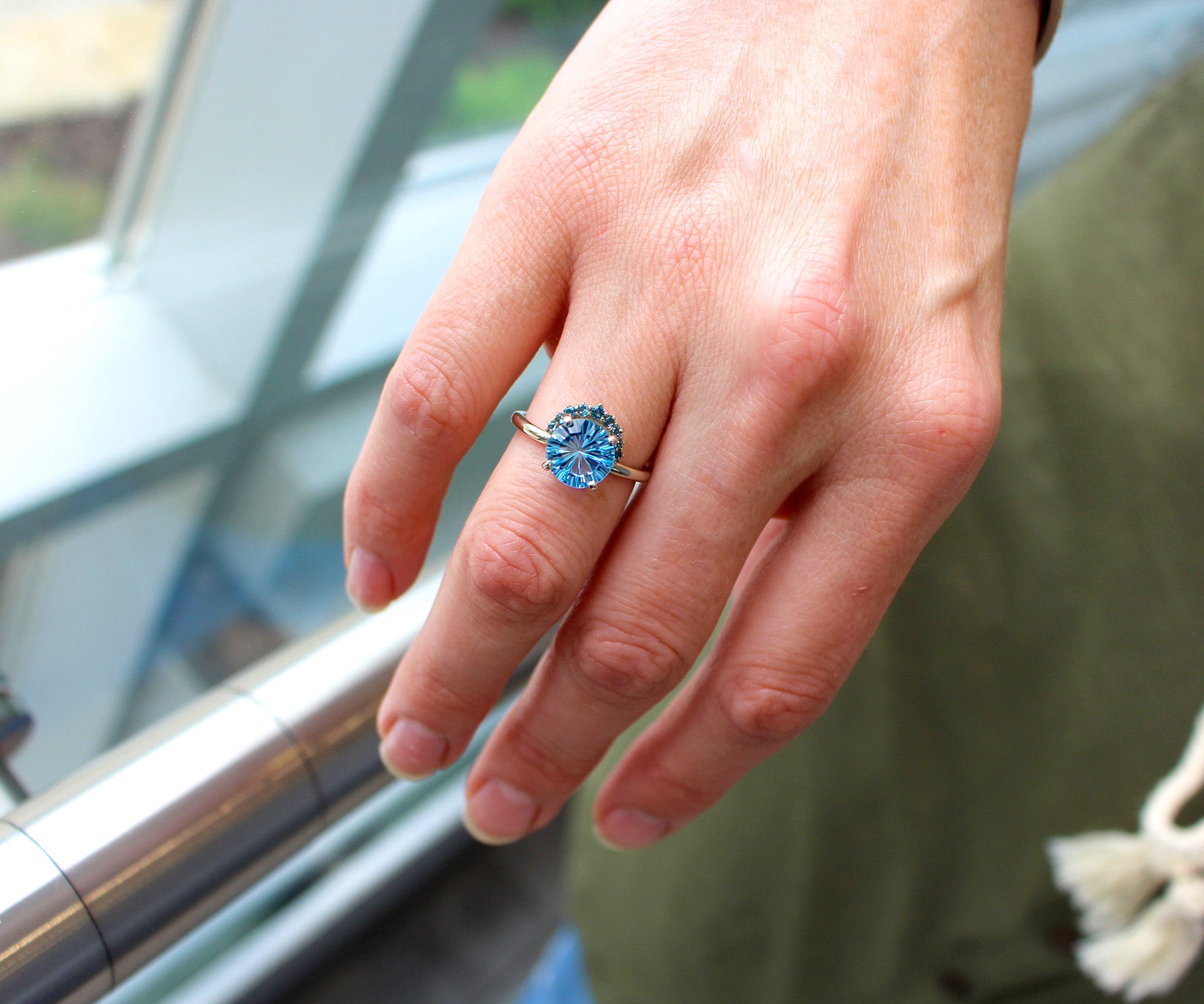 Half Halo Starburst Blue Topaz Ring