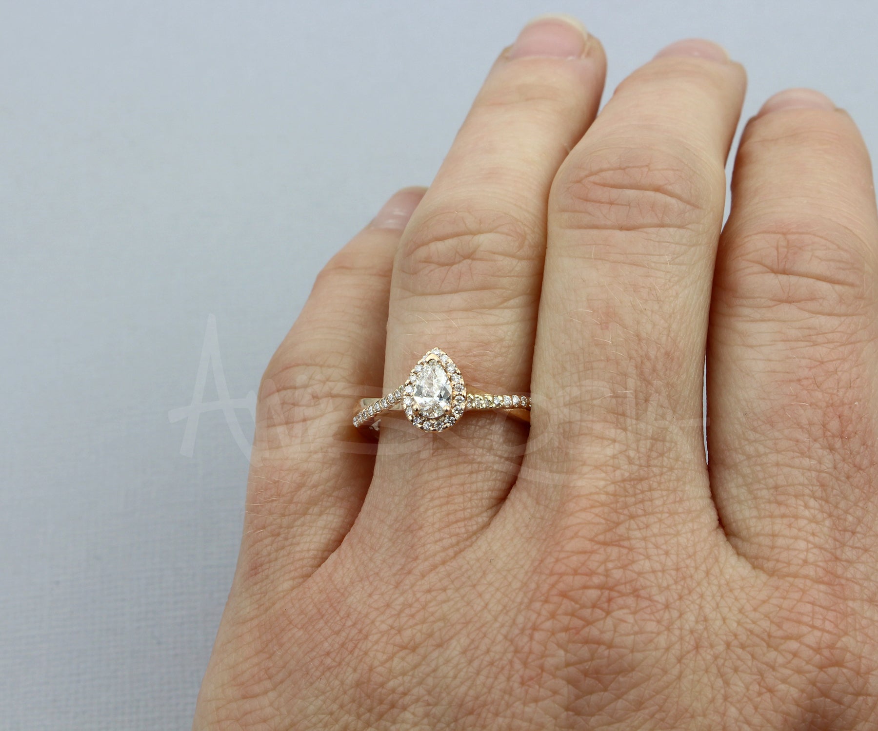 Pear Halo Twist Rose Gold Engagement Ring