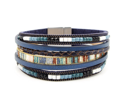 Elegante pulsera de cuero dorado y gris con estampado animal