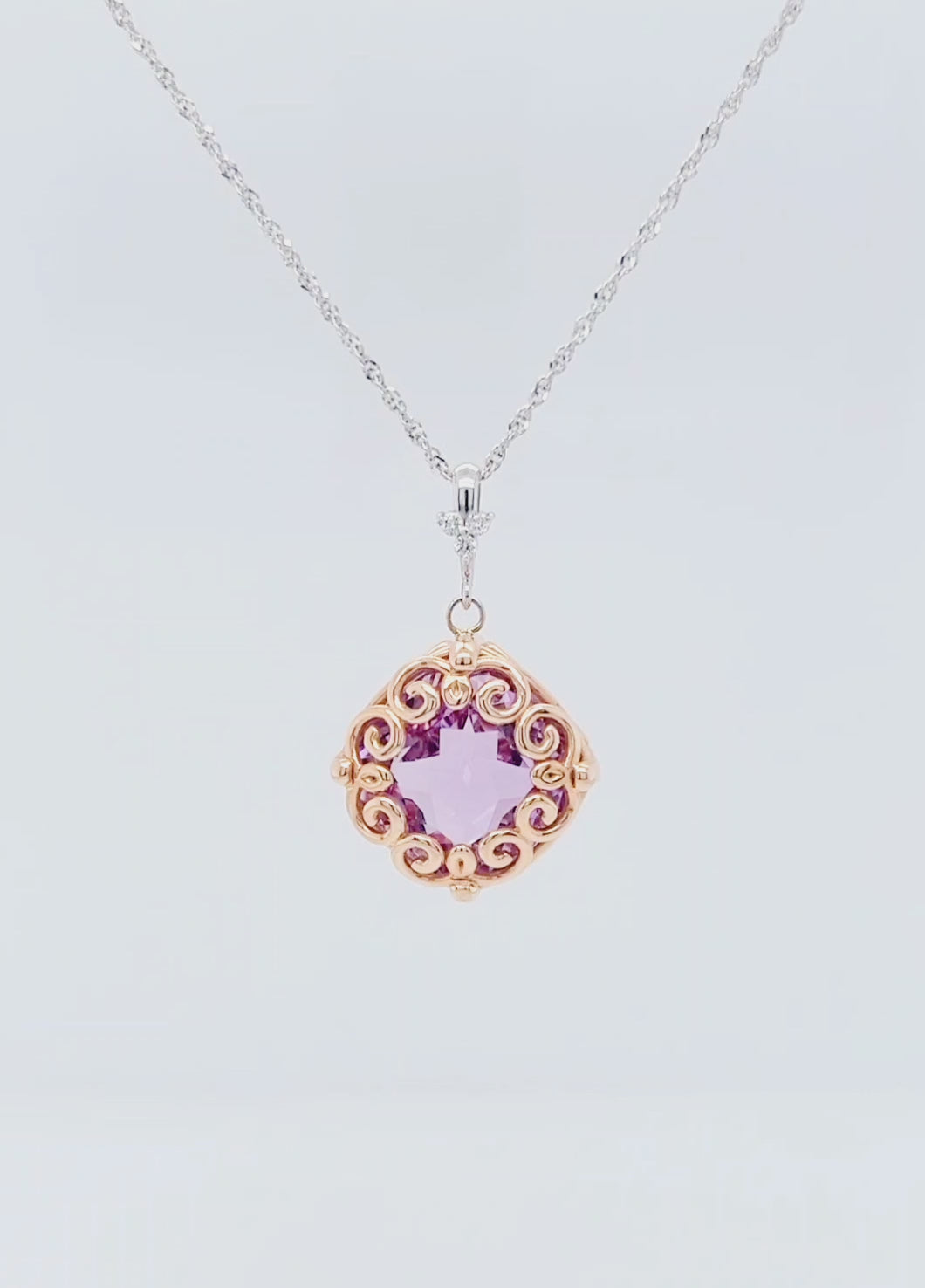 Collar de amatista y diamantes en espiral