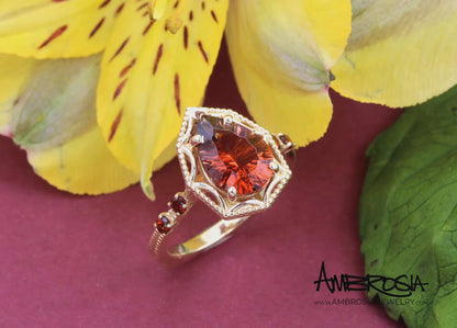 Starburst Teardrop Sunstone Garnet Gold Ring
