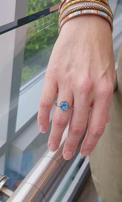 Half Halo Starburst Blue Topaz Ring