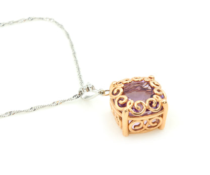 Collar de amatista y diamantes en espiral