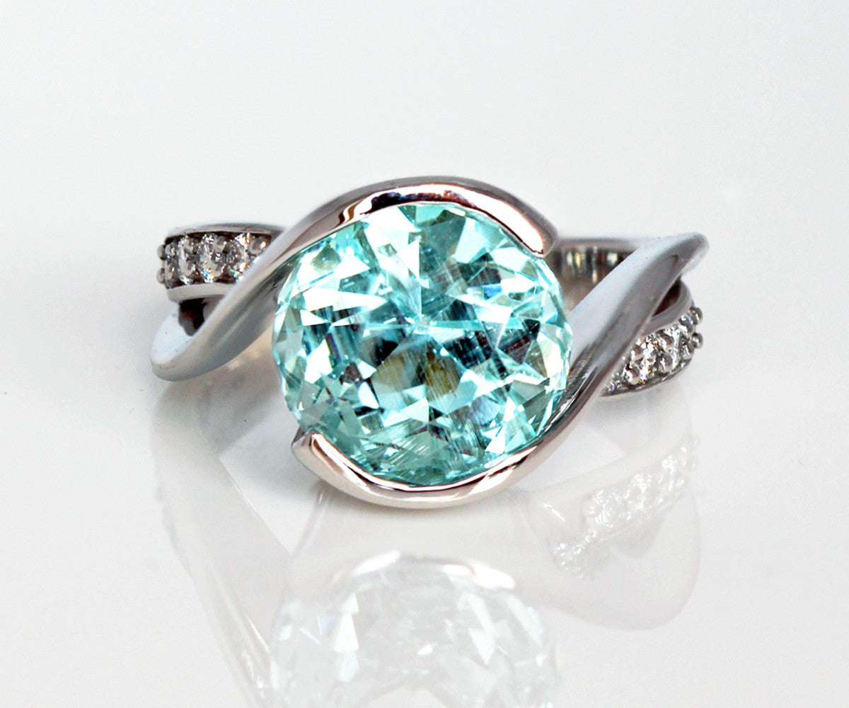 custom designed aquamarine and diamond bypass fashion ring