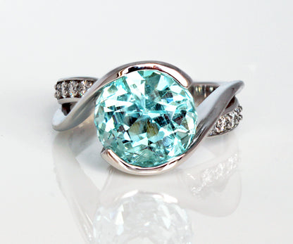 custom designed aquamarine and diamond bypass fashion ring