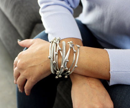 Pulsera de plata con cuentas y doble vuelta