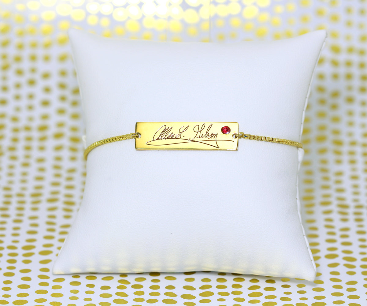 Pulsera personalizada con firma grabada como recuerdo