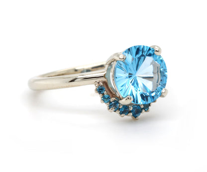 Half Halo Starburst Blue Topaz Ring