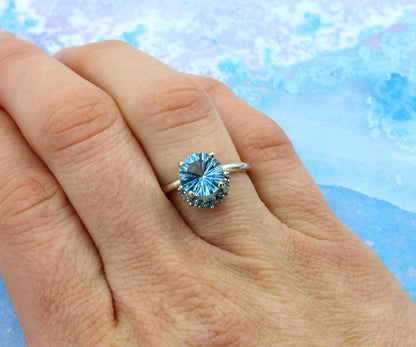 Half Halo Starburst Blue Topaz Ring