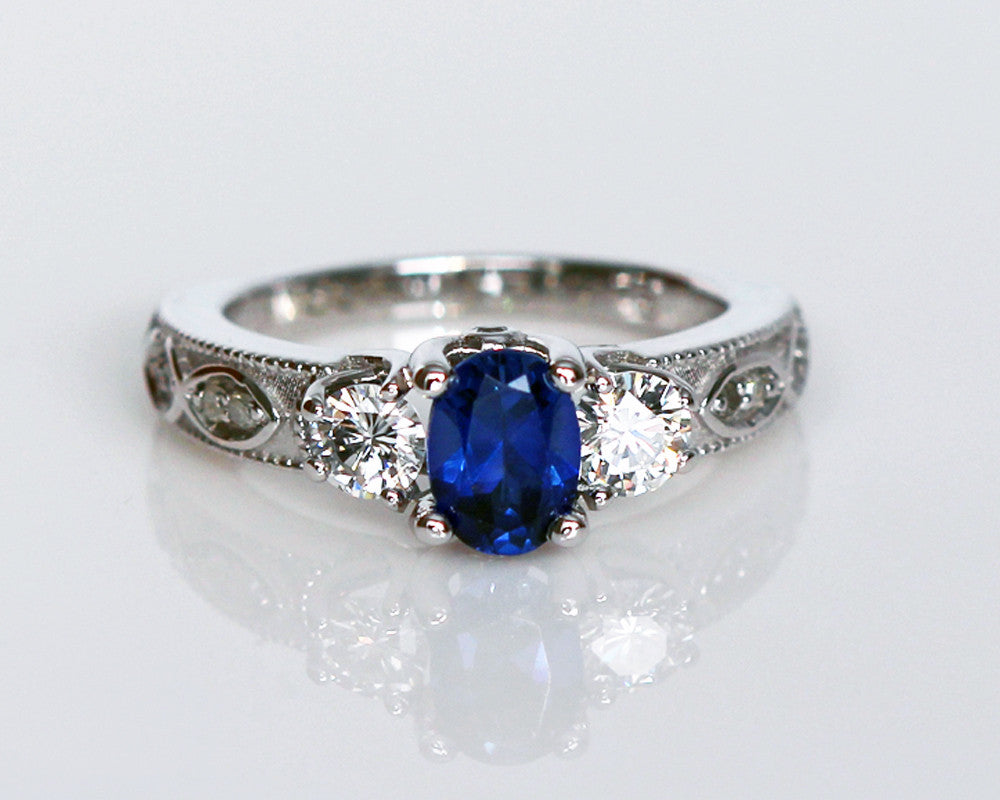 blue sapphire and diamond ichthys wedding ring