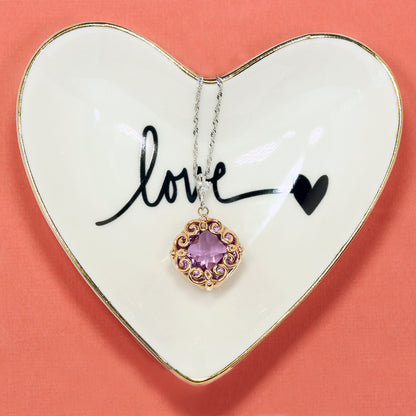 Collar de amatista y diamantes en espiral
