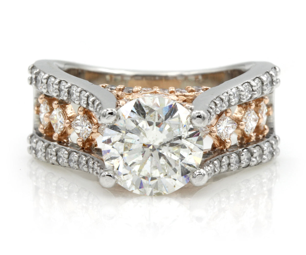 two tone rose and white gold cathedral diamond engagement ring