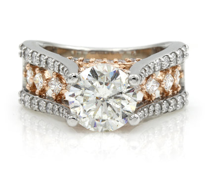 two tone rose and white gold cathedral diamond engagement ring