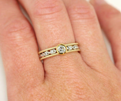 Rediseño del anillo con bisel de diamantes y diseño Infinity en dos tonos de oro