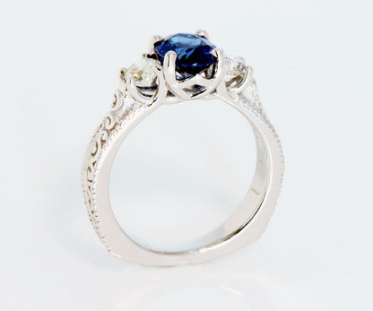 Anillo de compromiso con diamantes y zafiro azul vintage en forma de espiral