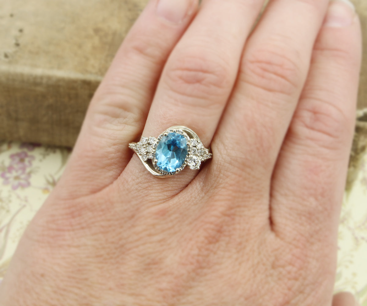 Oval Halo Swiss Topaz Cluster Diamond Ring