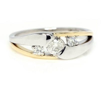 custom designed modern bypass twist two tone gold diamond contemporary engagement ring